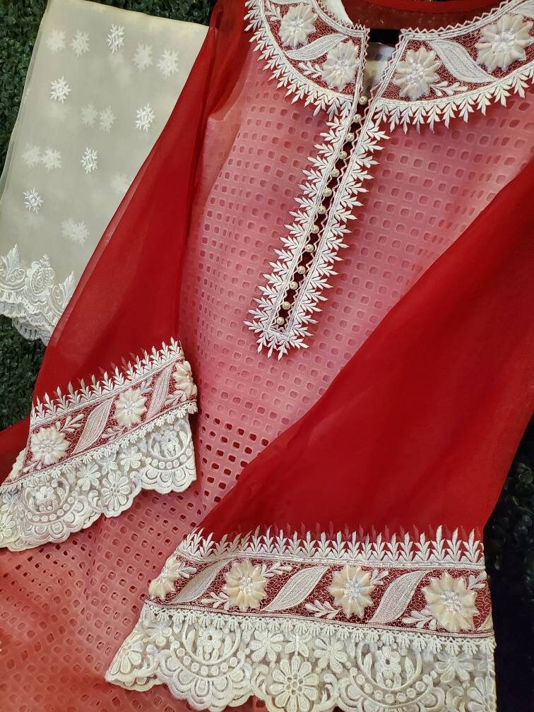 Red and white desi shalwar kameez. Size small.