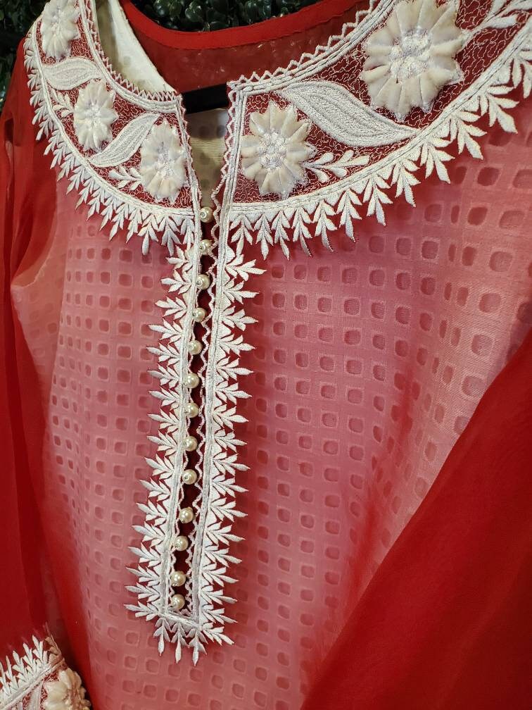 Red and white desi shalwar kameez. Size small.