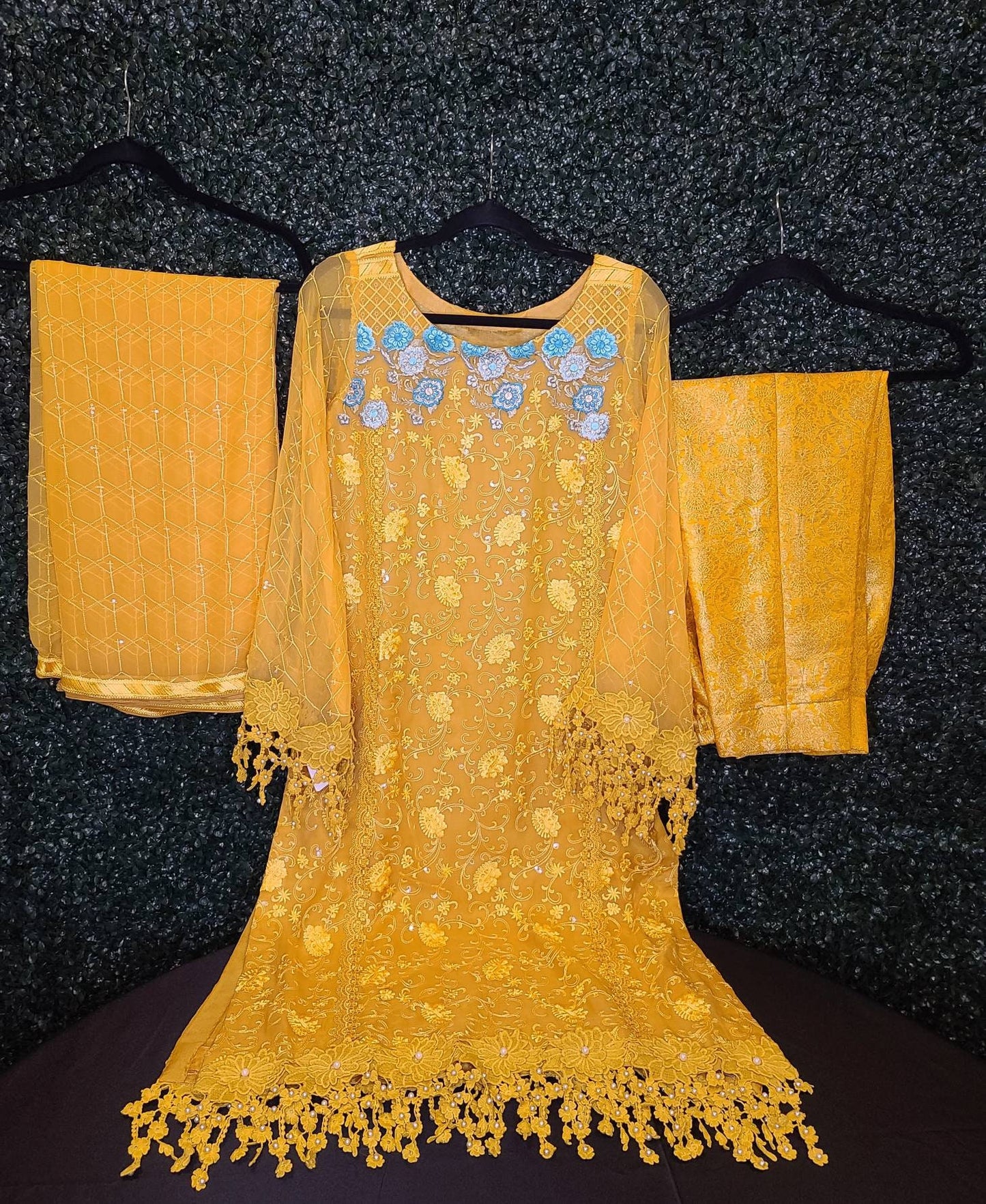 Beautiful yellow chikankari on pure chiffon.  Pakistani designer wear.