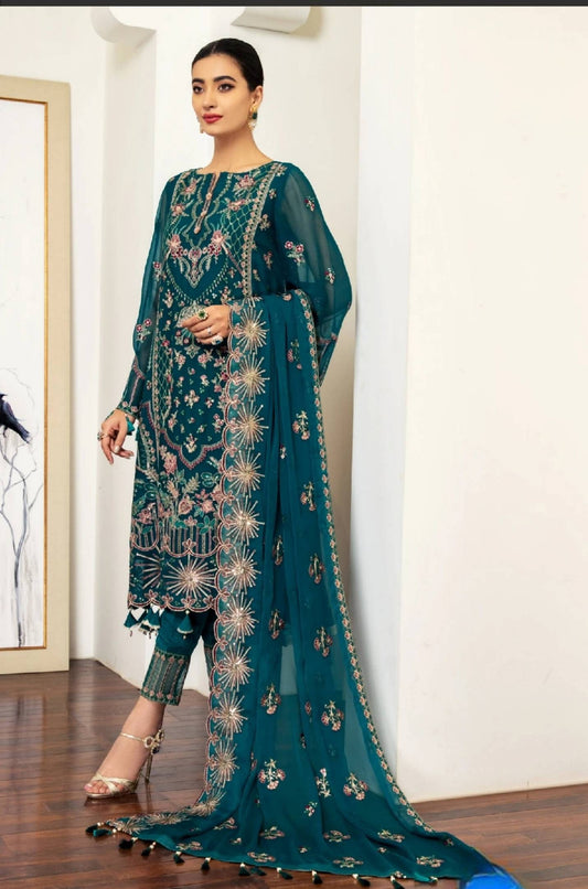 Green heavy embroidery suit. Pakistani,  Indian, Bangladeshi designer wear.