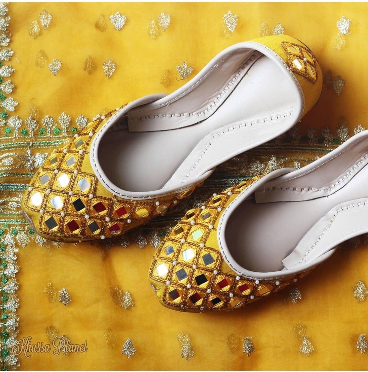 Featuring a stunning yellow mirror Embroidered khussa with detailed diamond placement of cut dana.