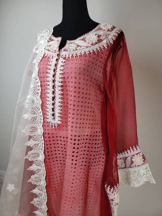 Red and white desi shalwar kameez. Size small.