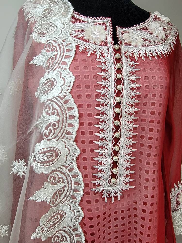 Red and white desi shalwar kameez. Size small.