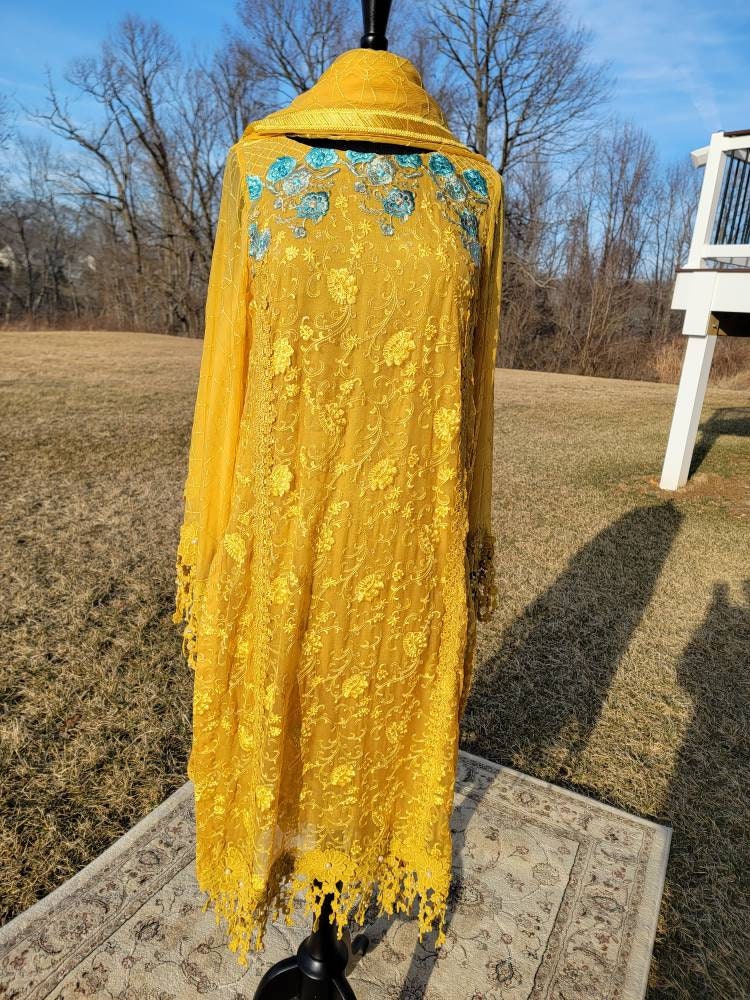 Beautiful yellow chikankari on pure chiffon.  Pakistani designer wear.