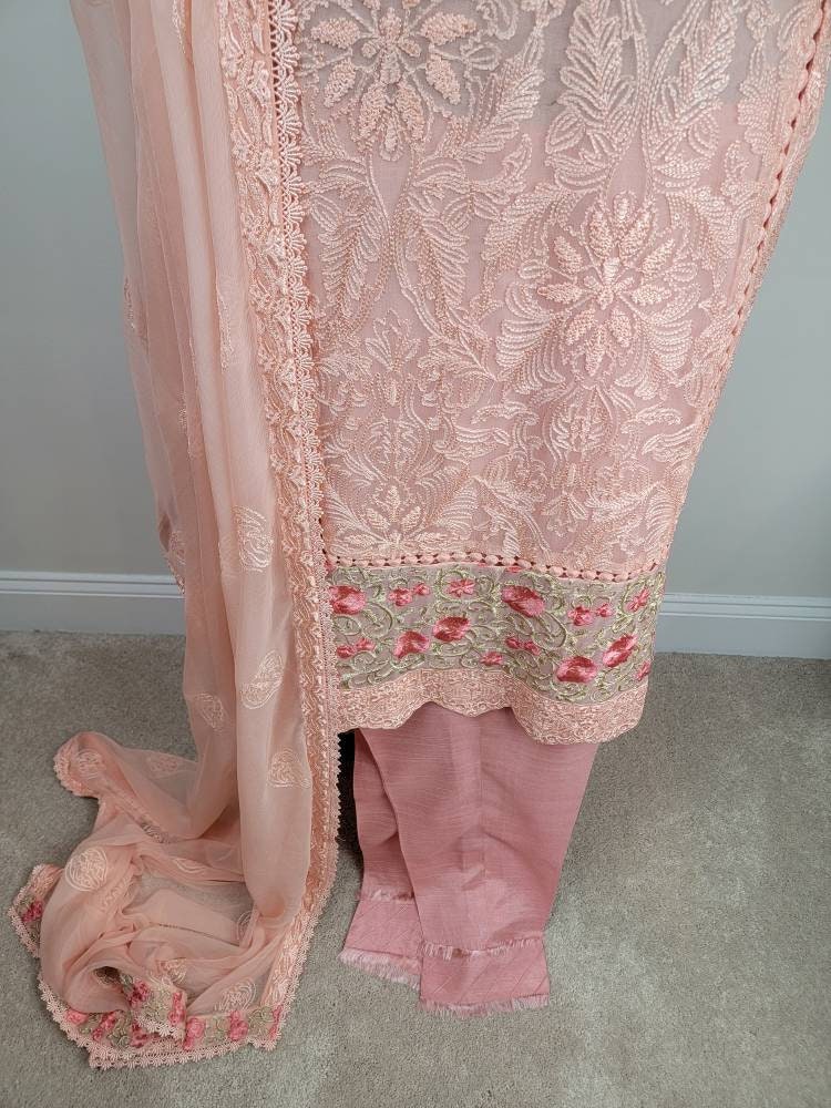 Gorgeous light pink chikankari formal wear.