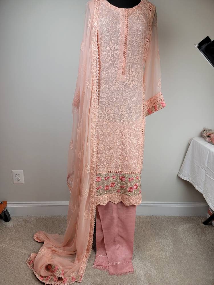 Gorgeous light pink chikankari formal wear.