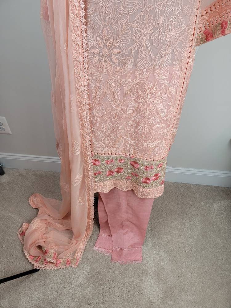 Gorgeous light pink chikankari formal wear.