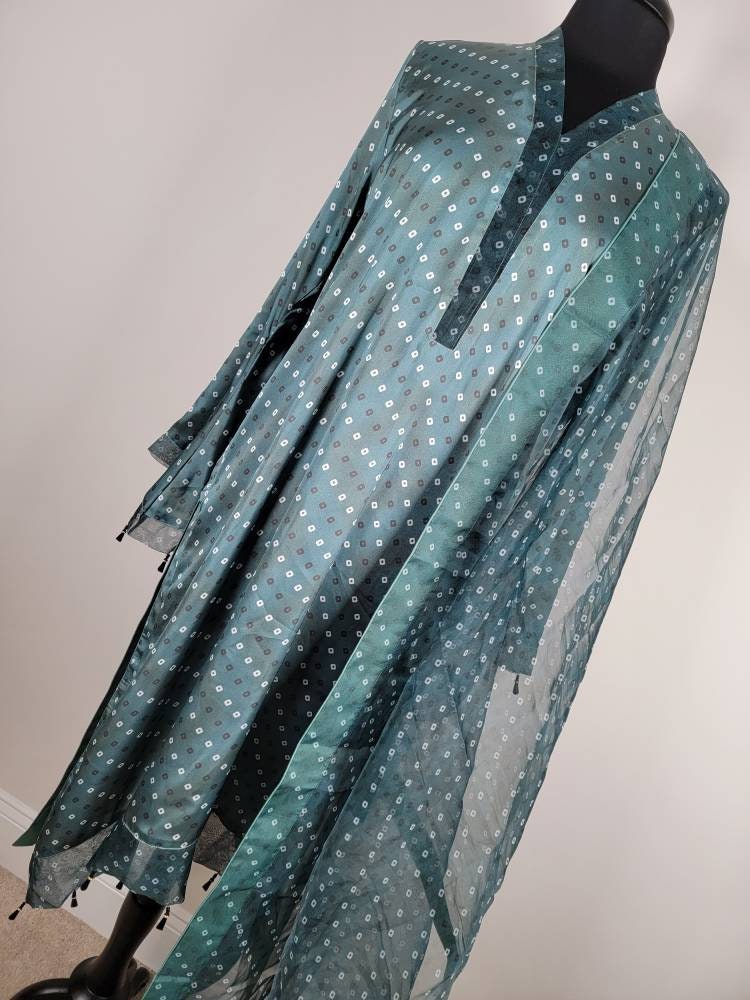 Chunri design silk shirt with plain silk pant and organza Dupatta.