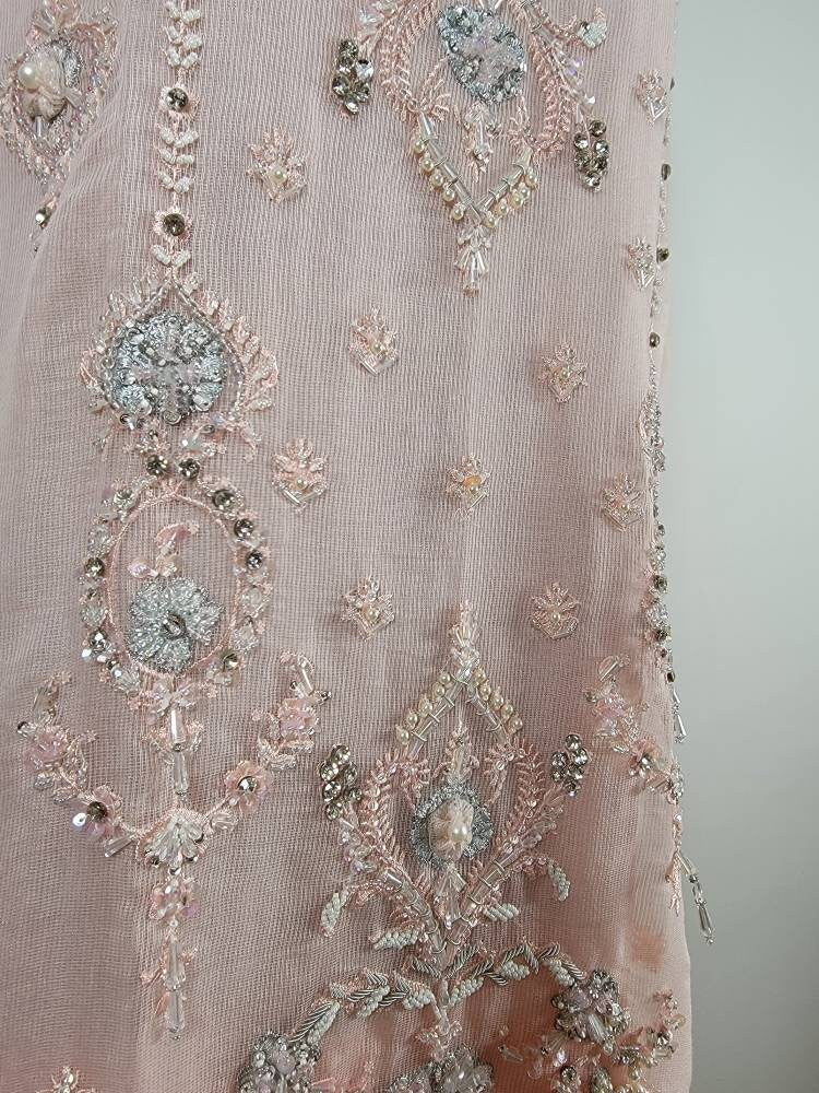 Baby pink heavy handwork shirt with silk straight pant and embroidered dupatta.