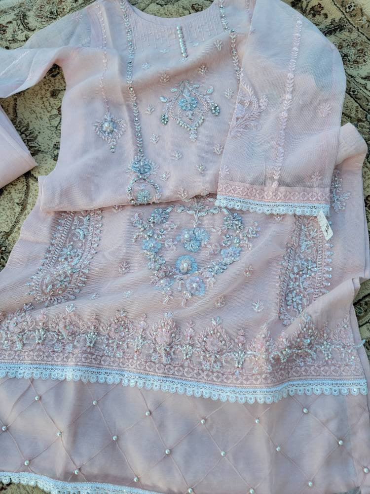 Baby pink heavy handwork shirt with silk straight pant and embroidered dupatta.