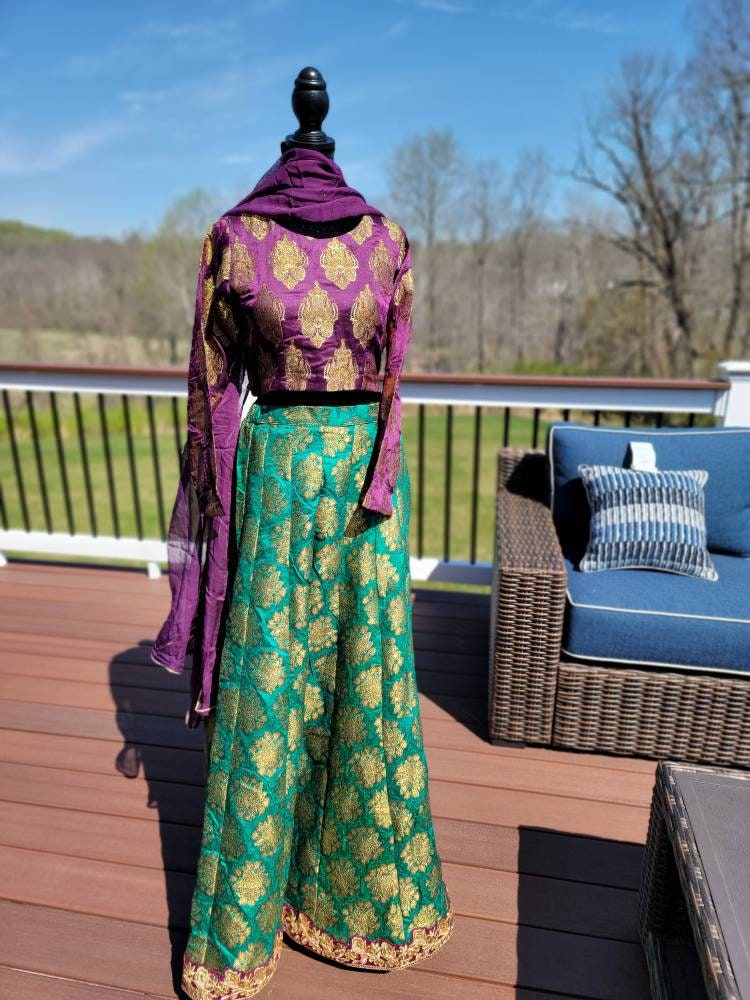 Purple/green pure atlas jamawar gharara with choli and duppata.