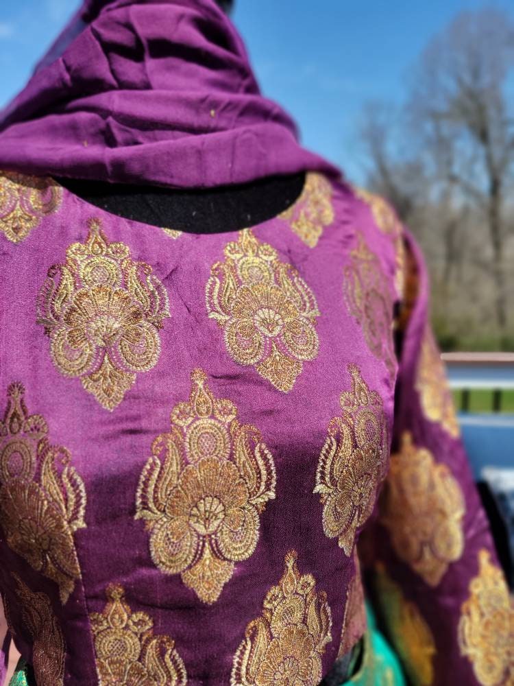 Purple/green pure atlas jamawar gharara with choli and duppata.