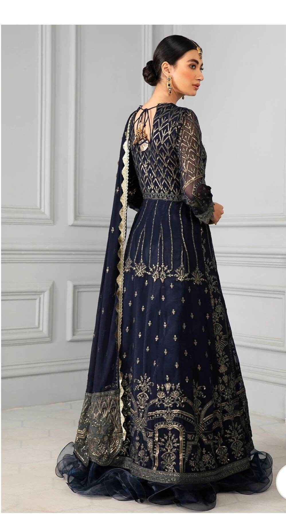 Navy blue Sequins Embroidered Chiffon shirt and duppata with raw silk pant.