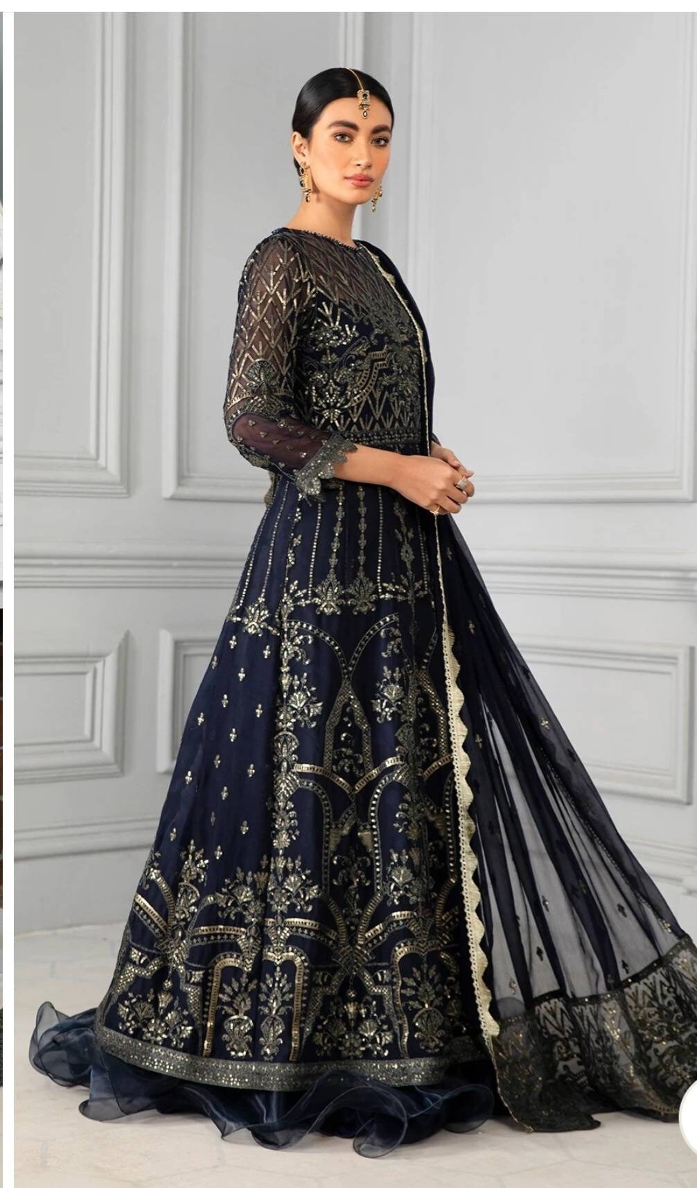 Navy blue Sequins Embroidered Chiffon shirt and duppata with raw silk pant.