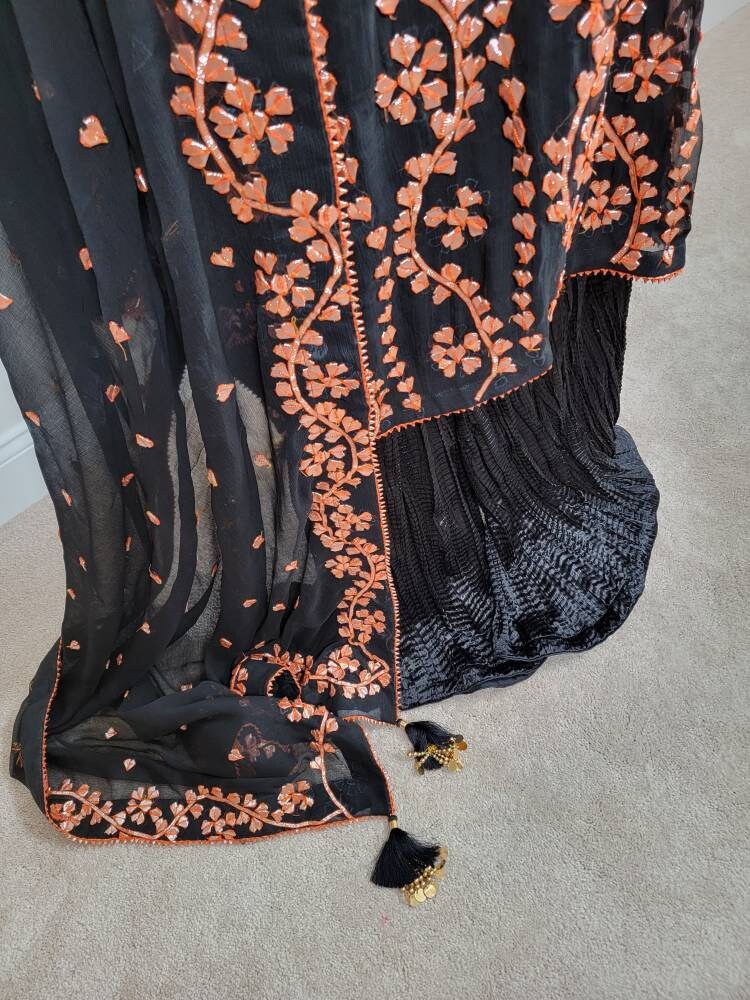 Black pure chiffon with heavy copper gota work on shirt and duppata, paired with silk crush plazzo pants. Pakistani designer wear. Ready to.