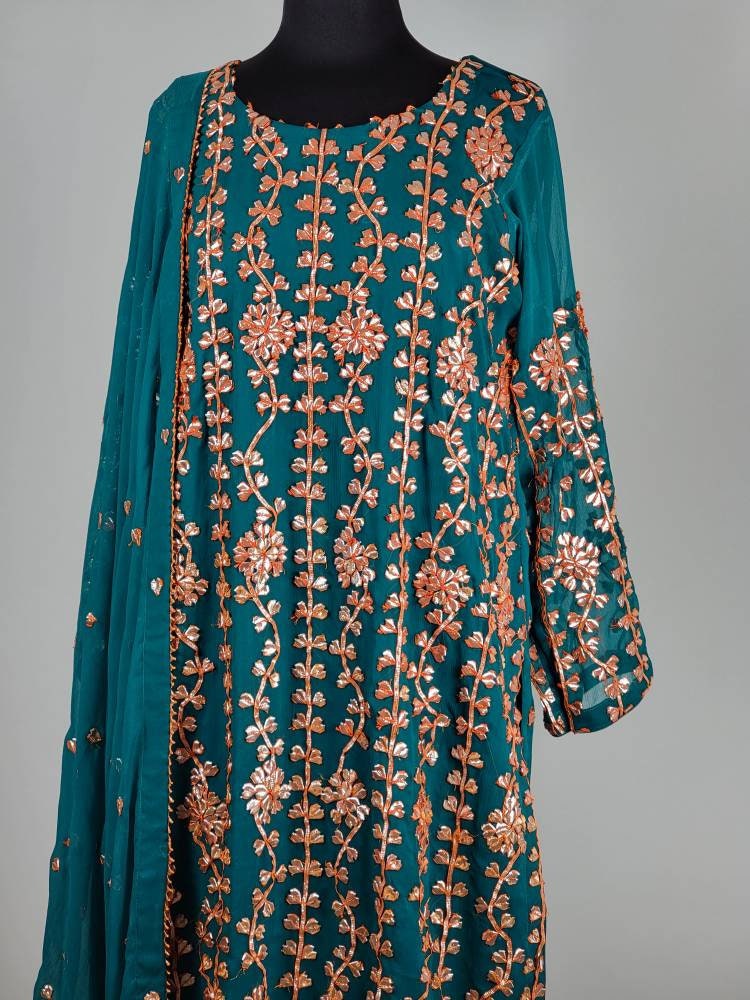 Sea green gota shirt with heavy gota work on duppata and crush silk plazzo pants.