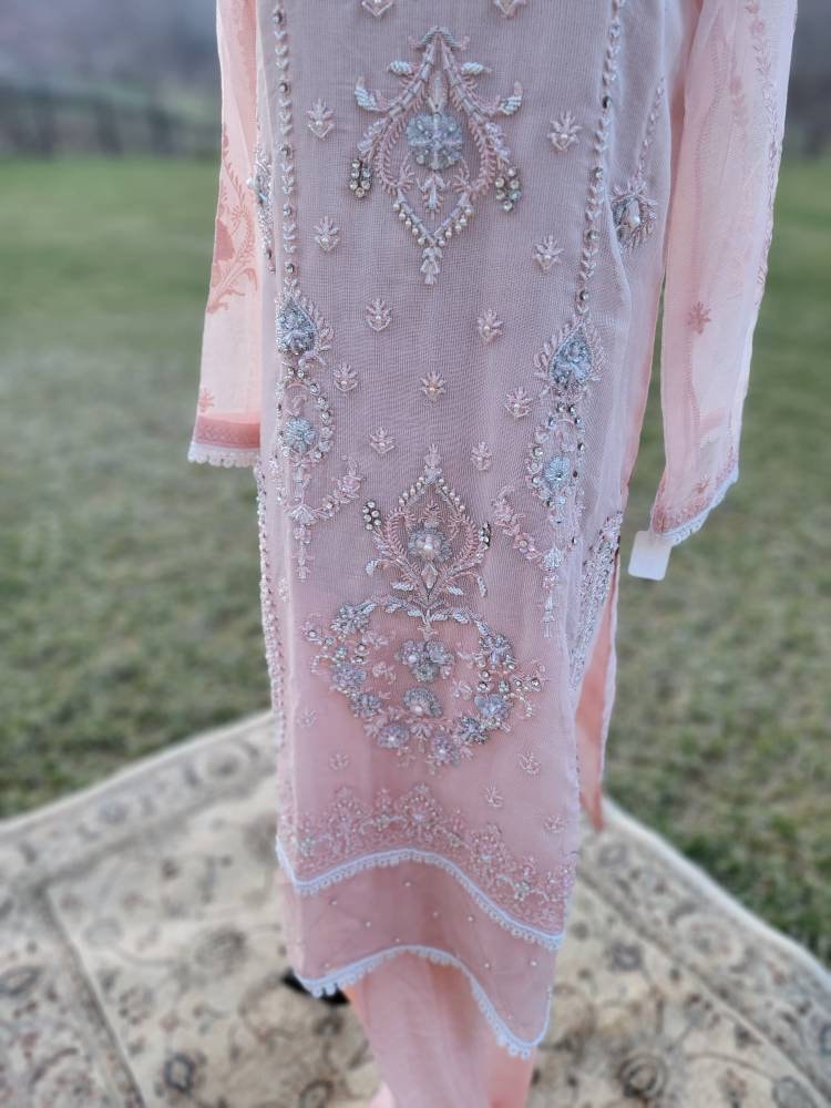 Baby pink heavy handwork shirt with silk straight pant and embroidered dupatta.