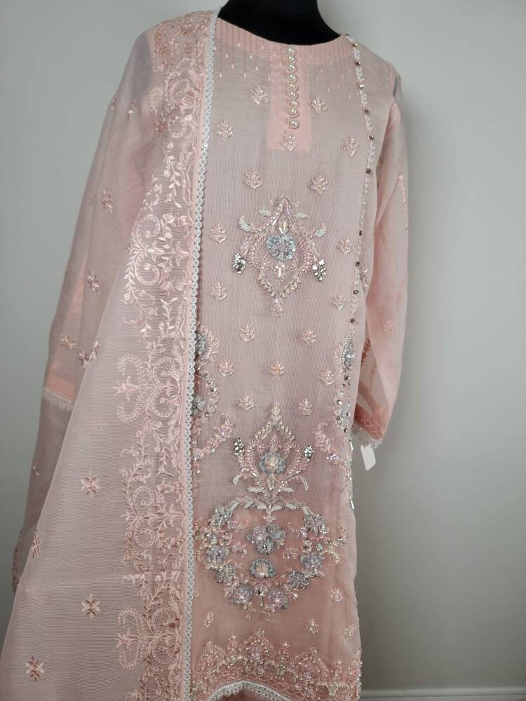 Baby pink heavy handwork shirt with silk straight pant and embroidered dupatta.