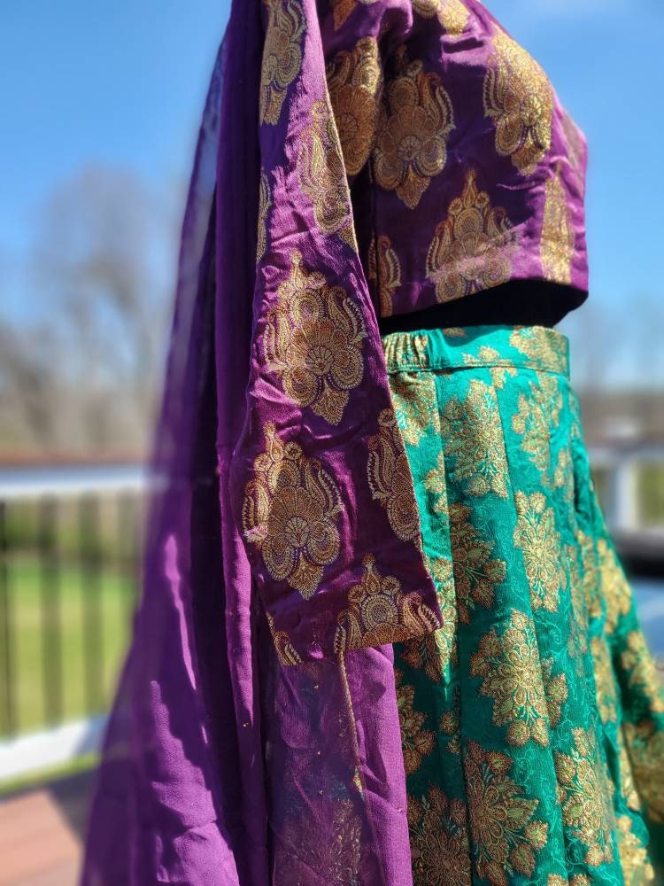 Purple/green pure atlas jamawar gharara with choli and duppata.