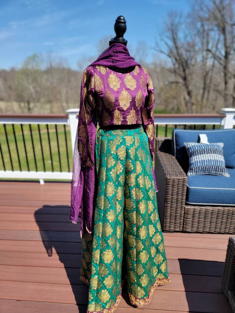 Purple/green pure atlas jamawar gharara with choli and duppata.