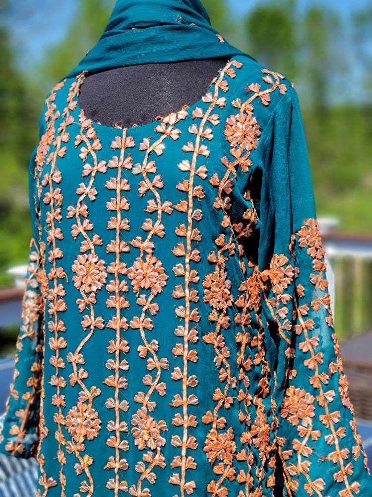 Sea green gota shirt with heavy gota work on duppata and crush silk plazzo pants.