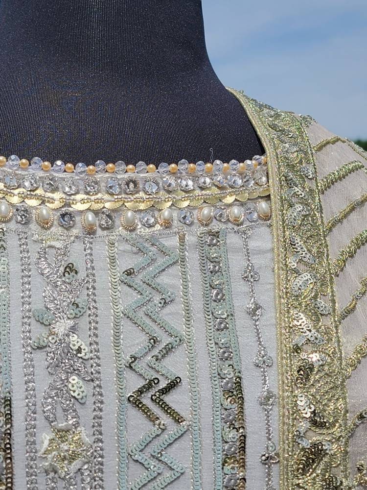 White chikankari with sequins shirt with duppata and lehenga.