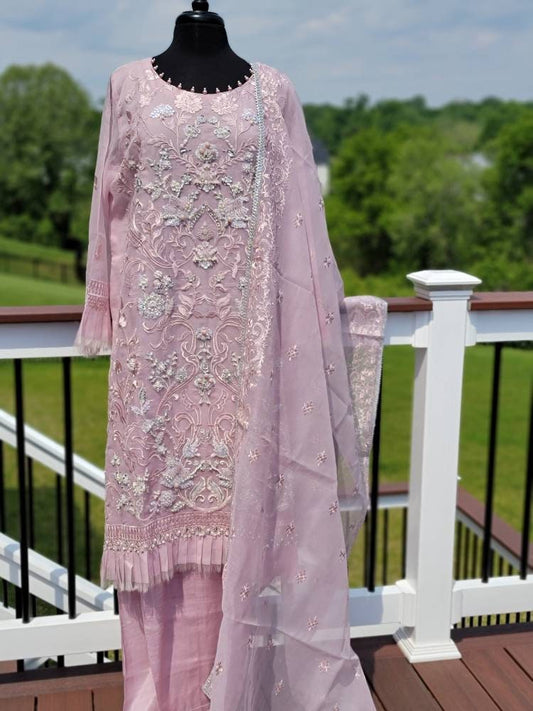 Summer is here. This light powder pink outfit is perfect for summer wardrobe. Heavy handwork on all over shirt.