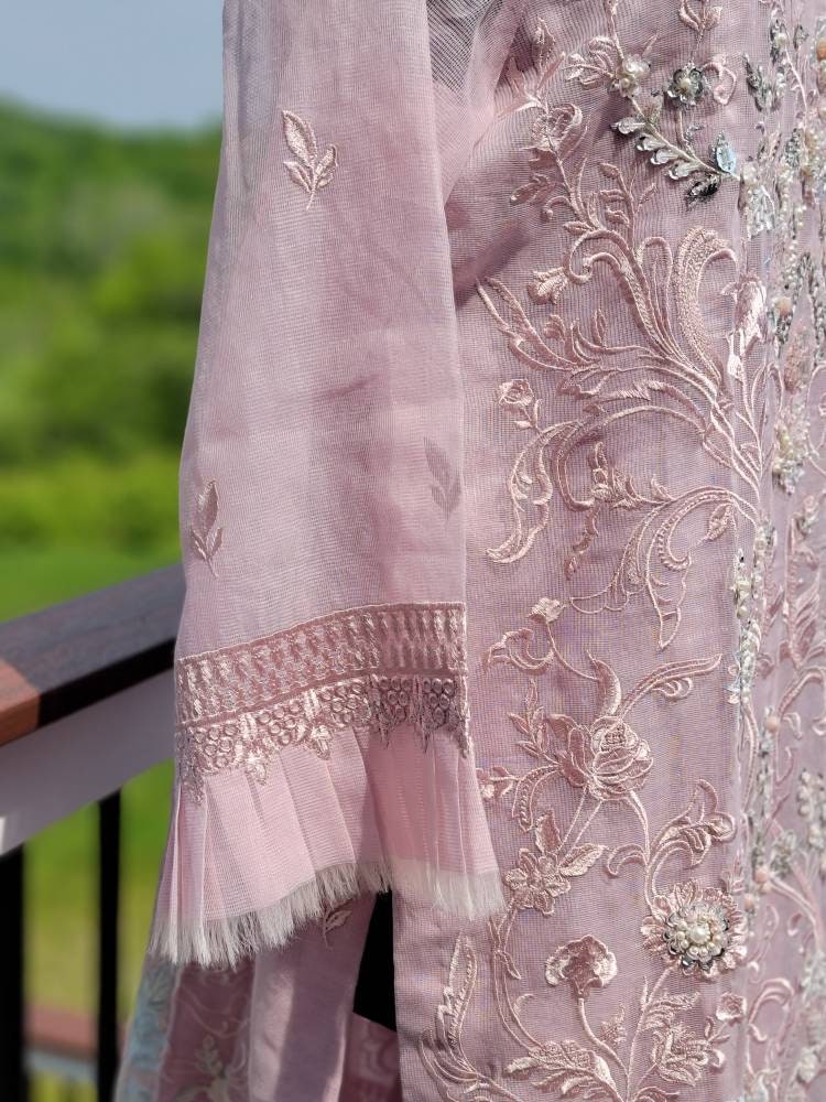 Summer is here. This light powder pink outfit is perfect for summer wardrobe. Heavy handwork on all over shirt.