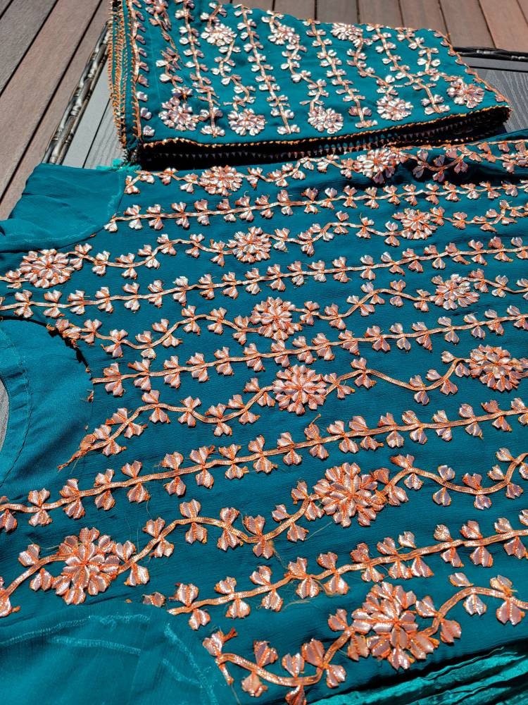 Sea green gota shirt with heavy gota work on duppata and crush silk plazzo pants.