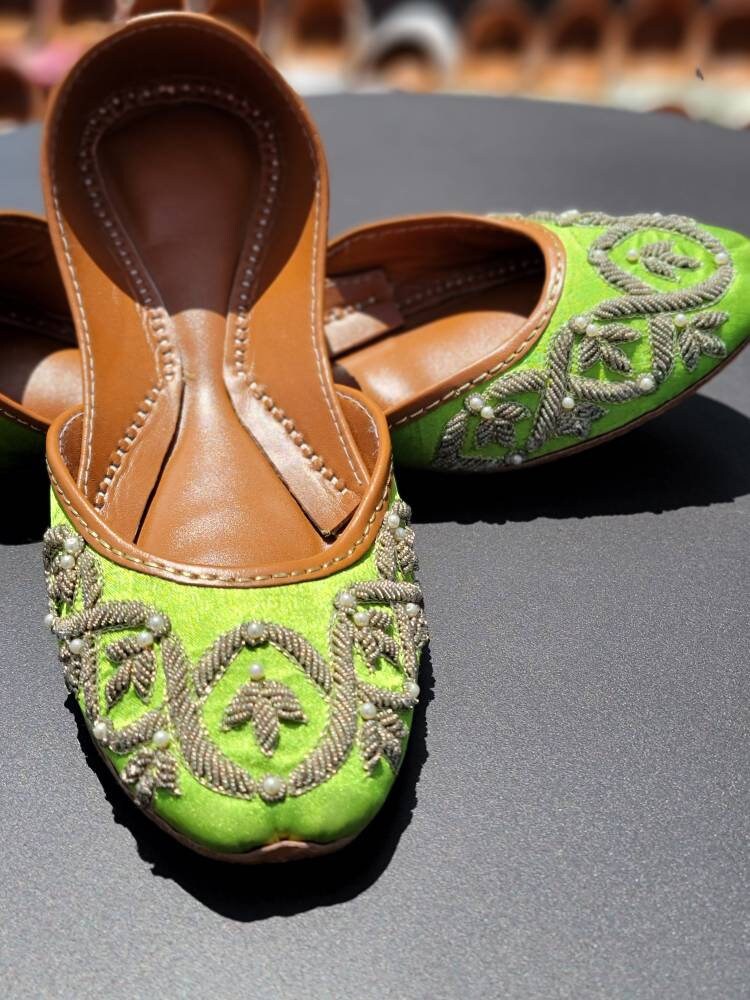 Gorgeous green khussa with kora dabka work.