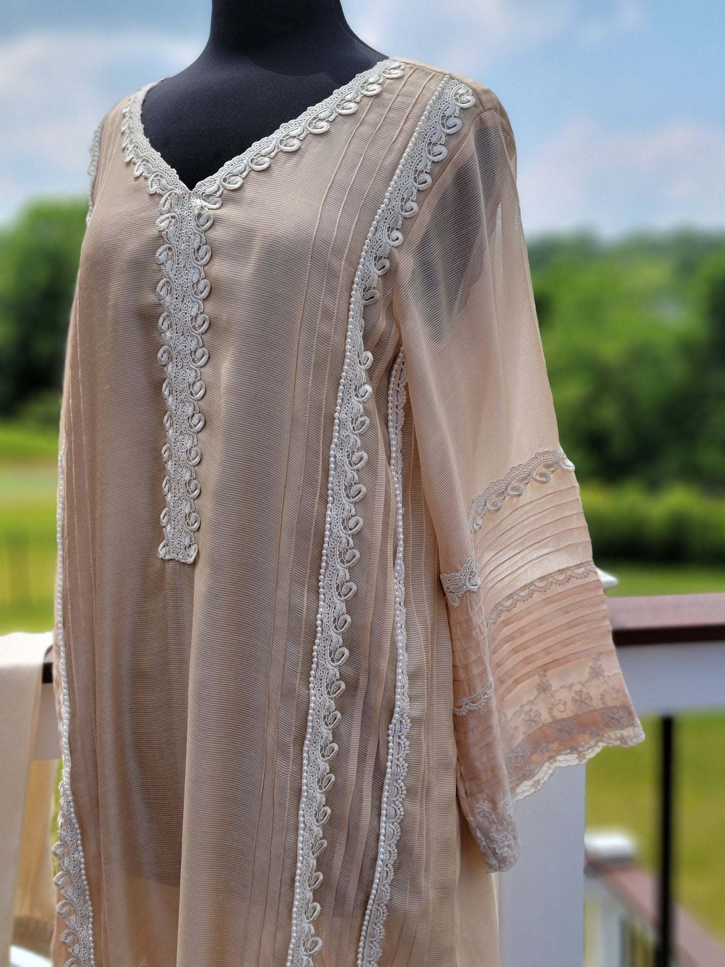 Net shirt with lace work,  pant and Dupatta.  Pakistani designer wear.  Formal wear.