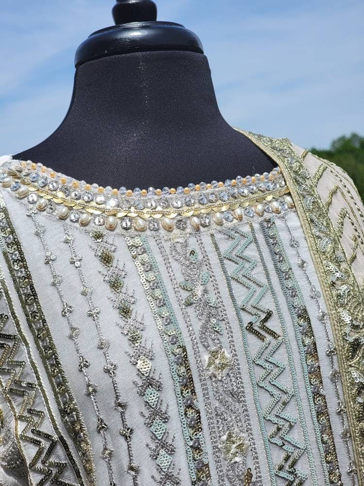 White chikankari with sequins shirt with duppata and lehenga.