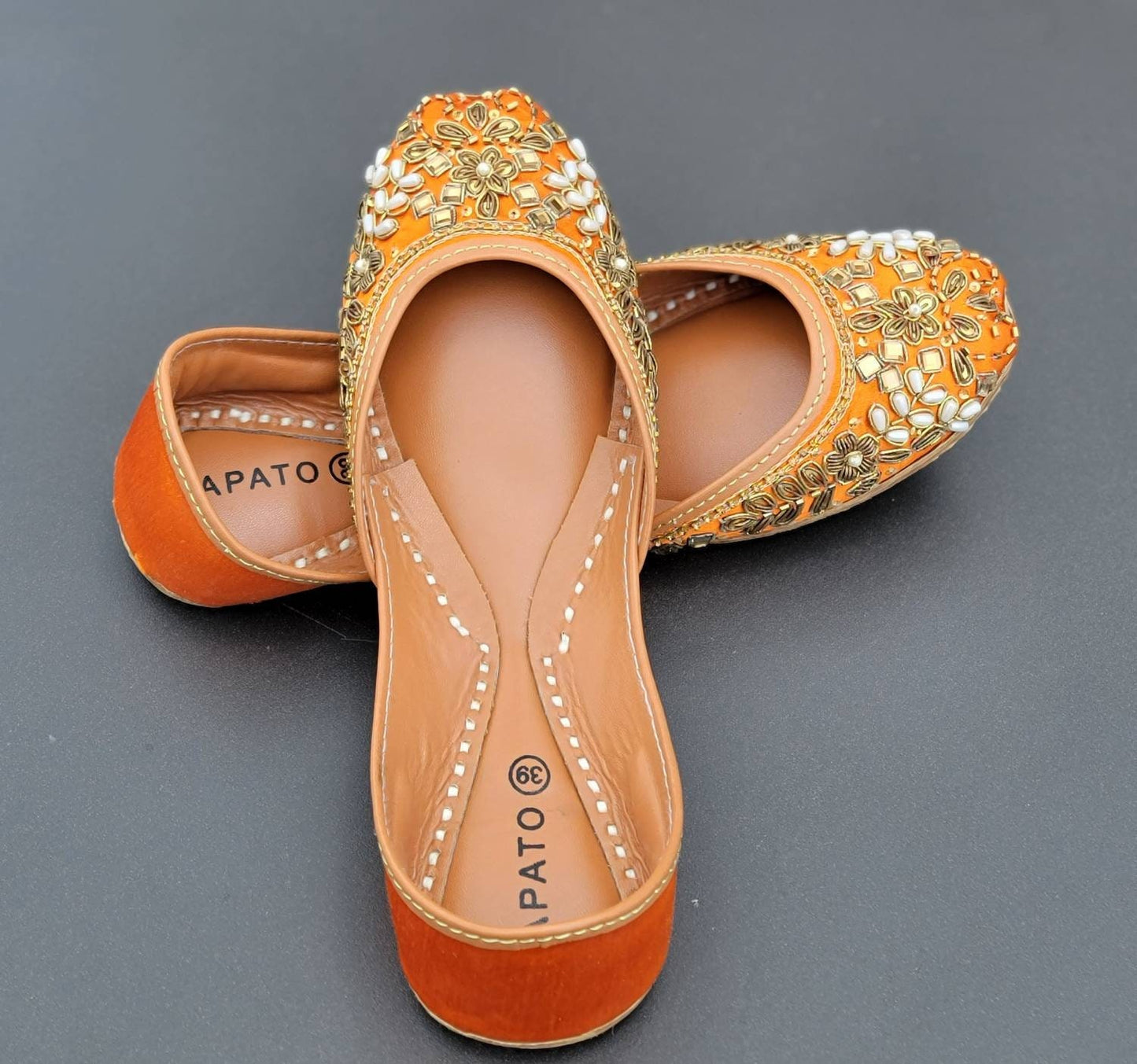 Orange khussa with mirror work.  Pakistani ready to wear.