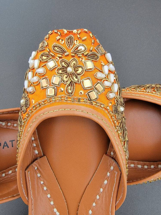 Orange khussa with mirror work.  Pakistani ready to wear.