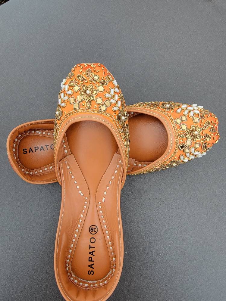 Orange khussa with mirror work.  Pakistani ready to wear.