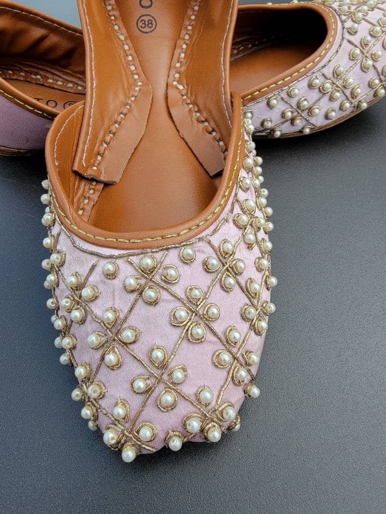 Pink  khussa with pearl work.