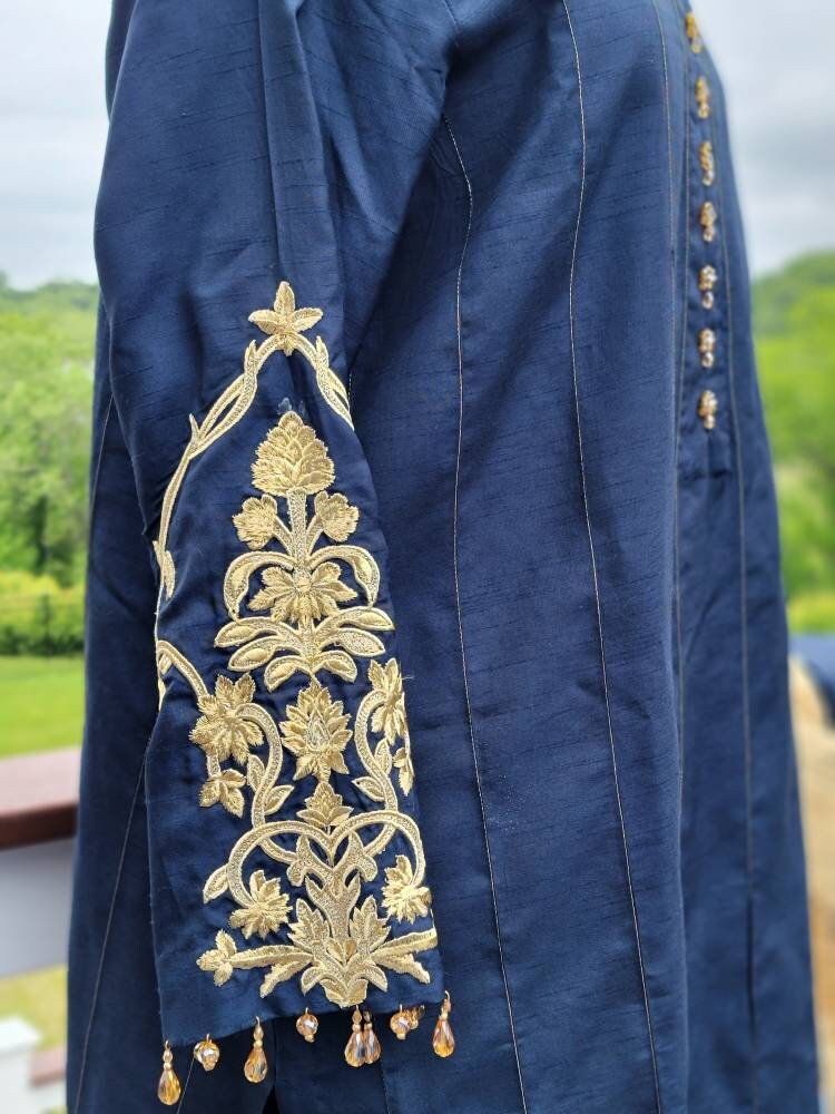 Navy blue raw silk shirt and shalwar with organza gota work duppata. Pakistani designer. Qalamkar.