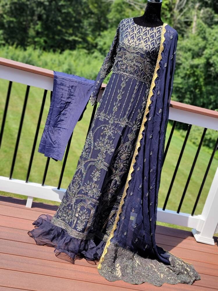 Navy blue Sequins Embroidered Chiffon shirt and duppata with raw silk pant.