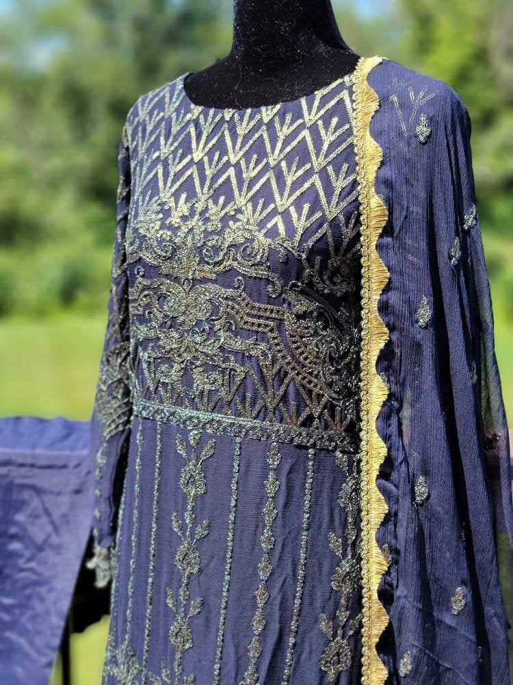 Navy blue Sequins Embroidered Chiffon shirt and duppata with raw silk pant.