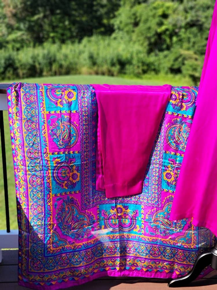 Pink silk shirt and straight pant with block print silk dupatta.