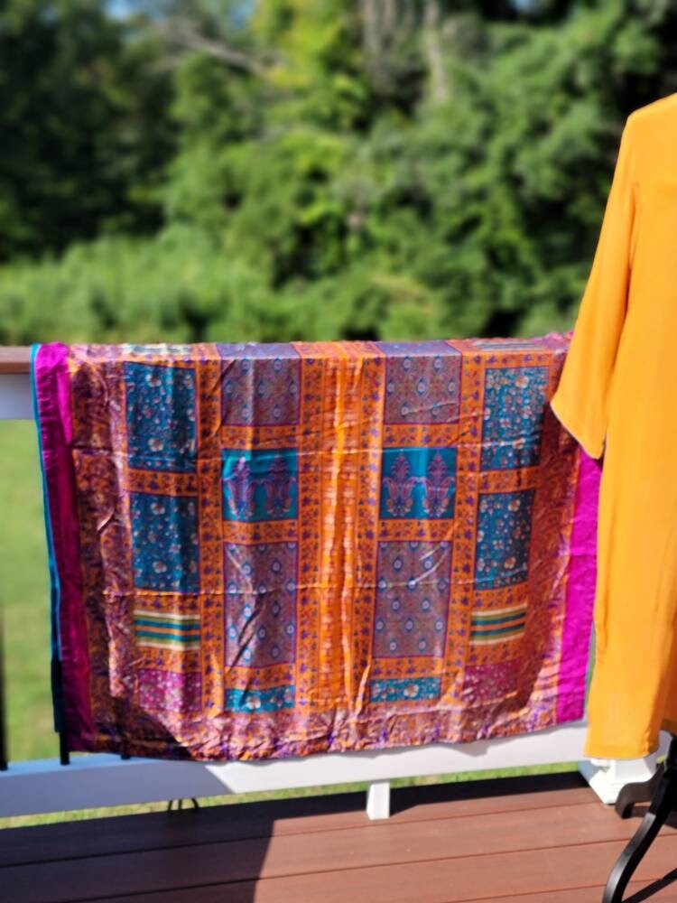 Orange Crinkle Chiffon shirt with pant and block print silk dupatta. Pakistani ready to wear.