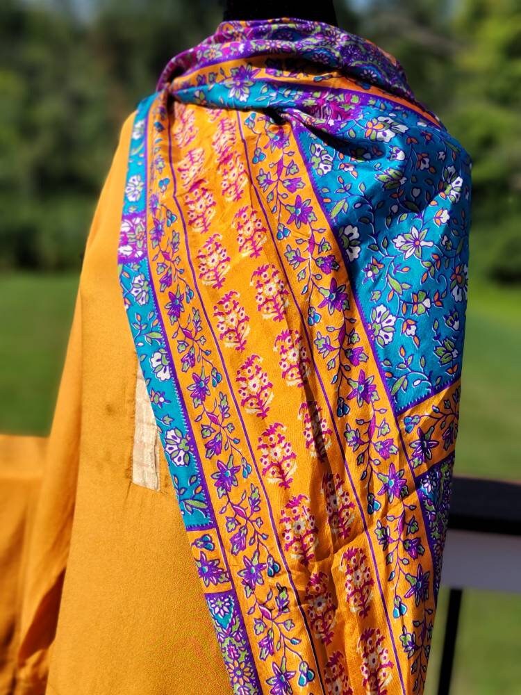 Orange Crinkle Chiffon shirt with pant and block print silk dupatta. Pakistani ready to wear.