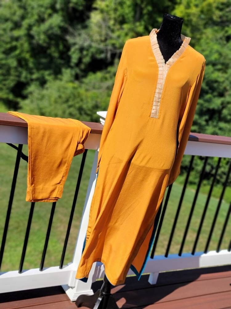 Orange Crinkle Chiffon shirt with pant and block print silk dupatta. Pakistani ready to wear.