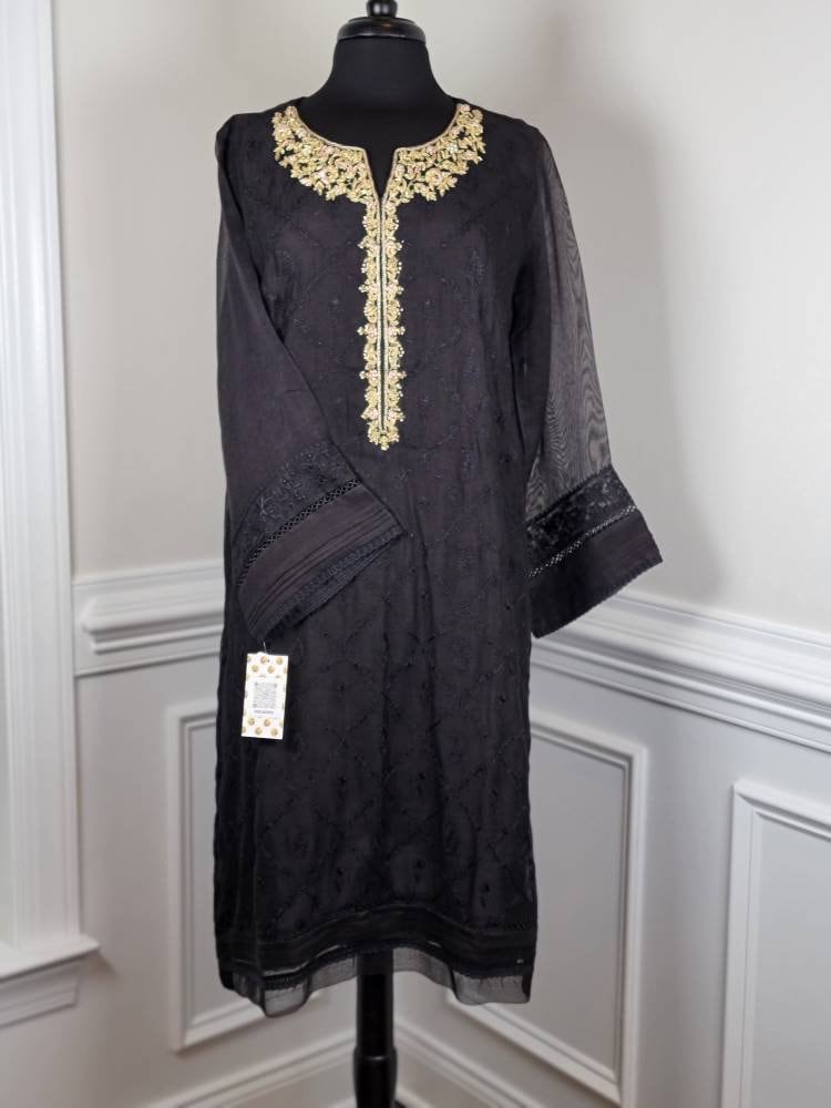 Black cotton net shirt with handwork on gala . Paired with raw silk pant.  Agha noor. Ready to wear.