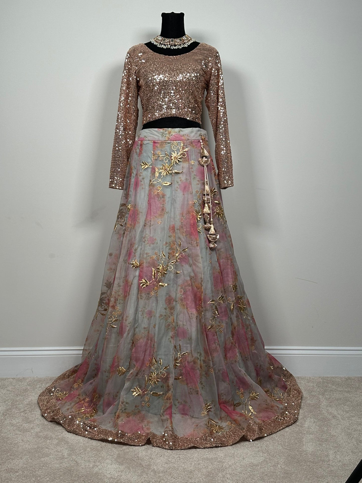 Gorgeous organza lehenga with all over pearl work. Paired with sequins choli and organza dupatta. Pakistani designer wear.