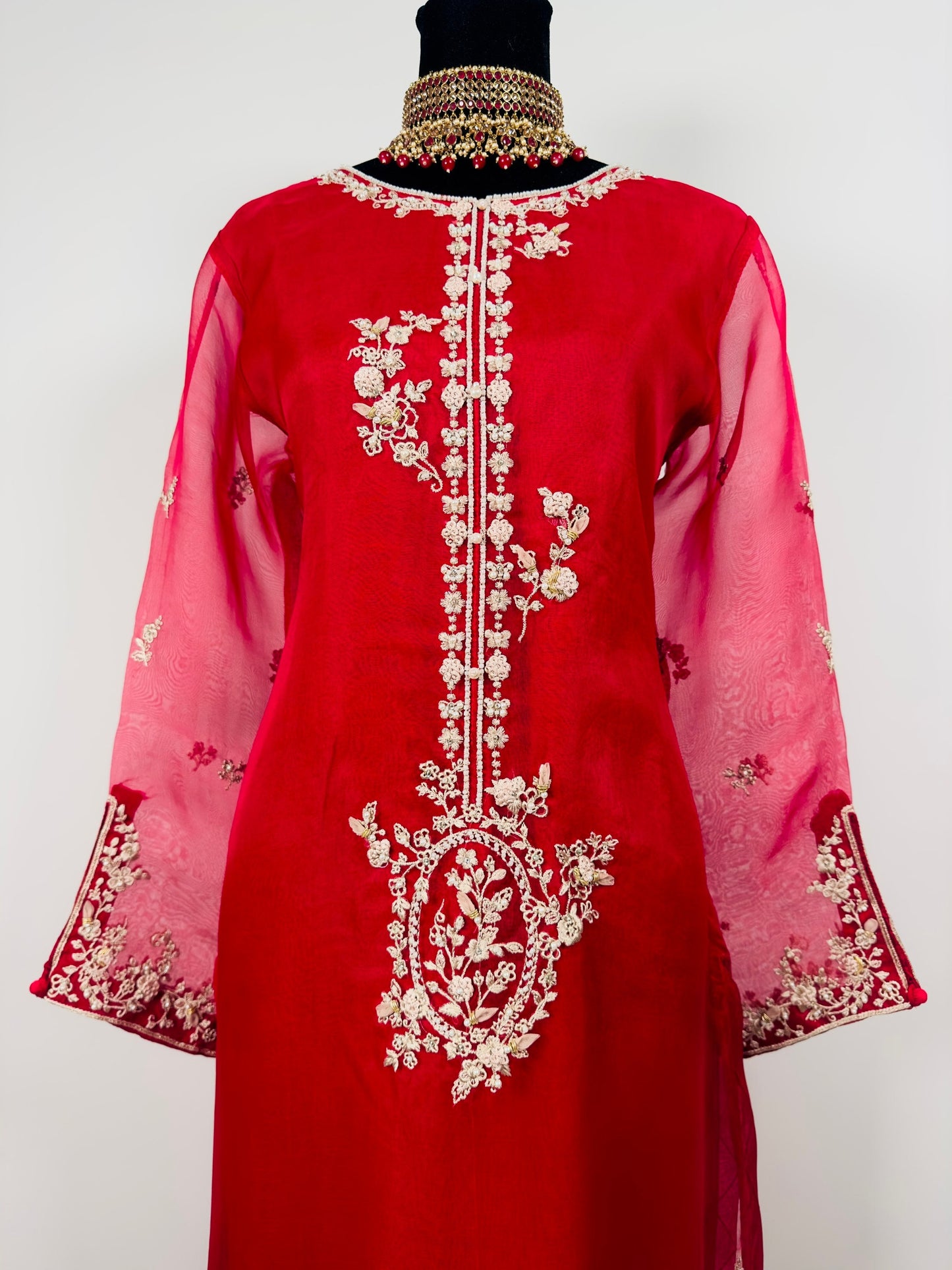 Red agha noor. Three piece pure organza shirt with silk duppata and silk pants.