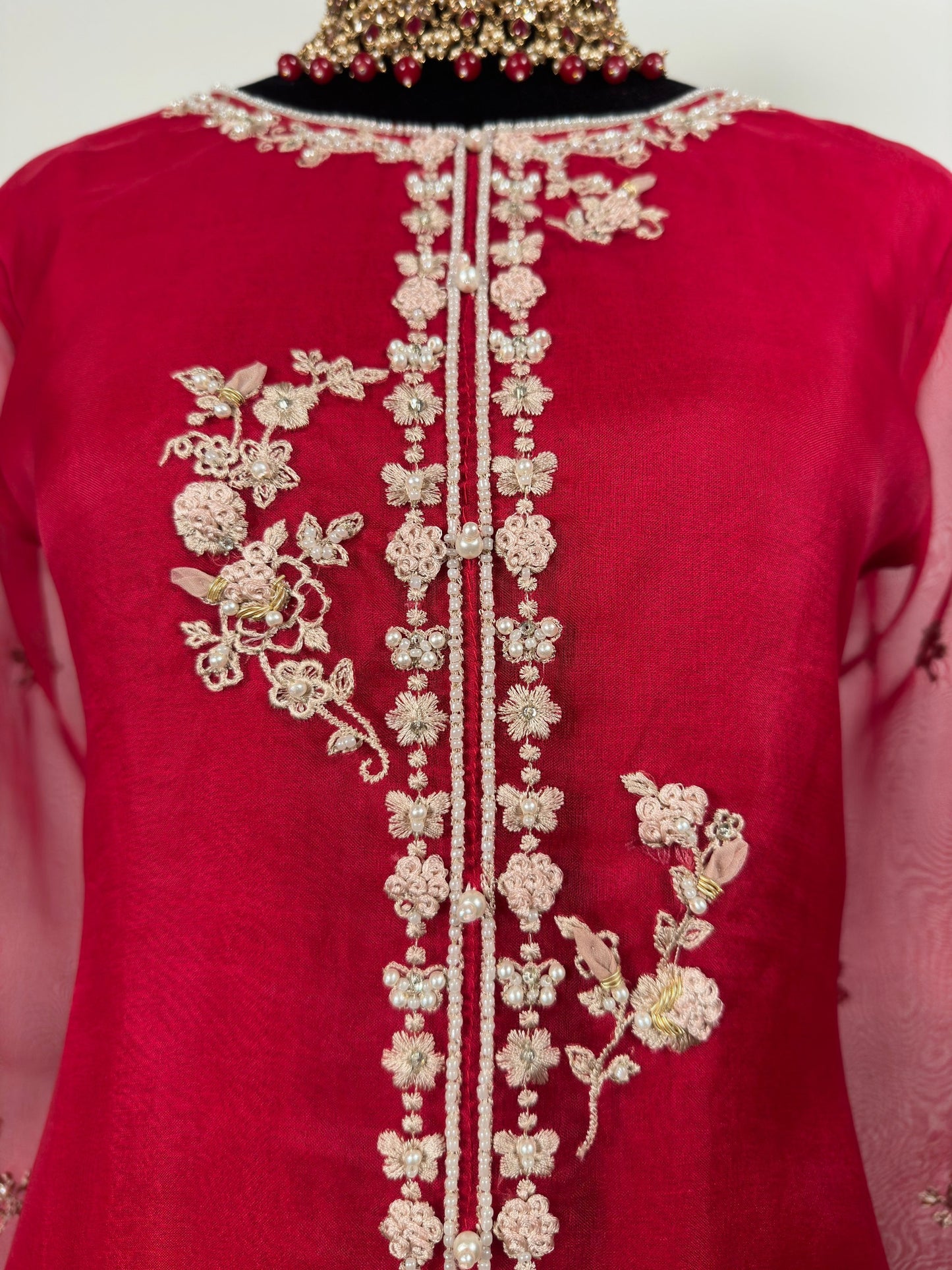 Red agha noor. Three piece pure organza shirt with silk duppata and silk pants.