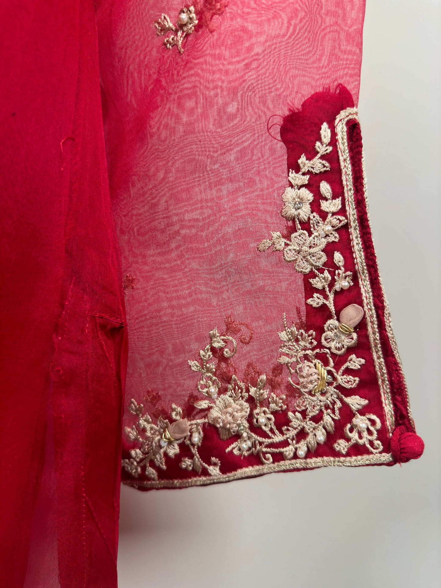 Red agha noor. Three piece pure organza shirt with silk duppata and silk pants.