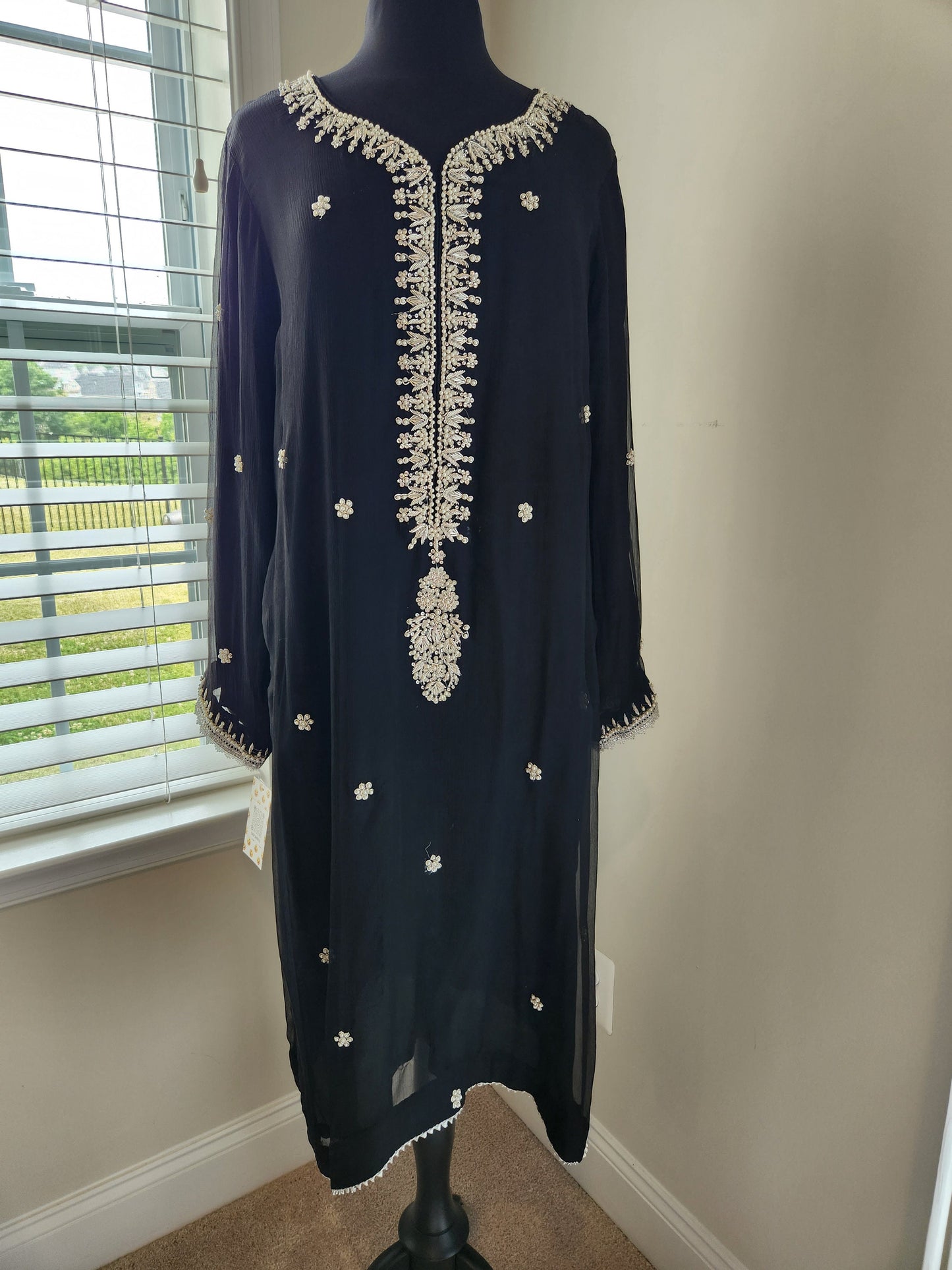 Black chiffon with silver kora dabka pearl handwork. Size large .