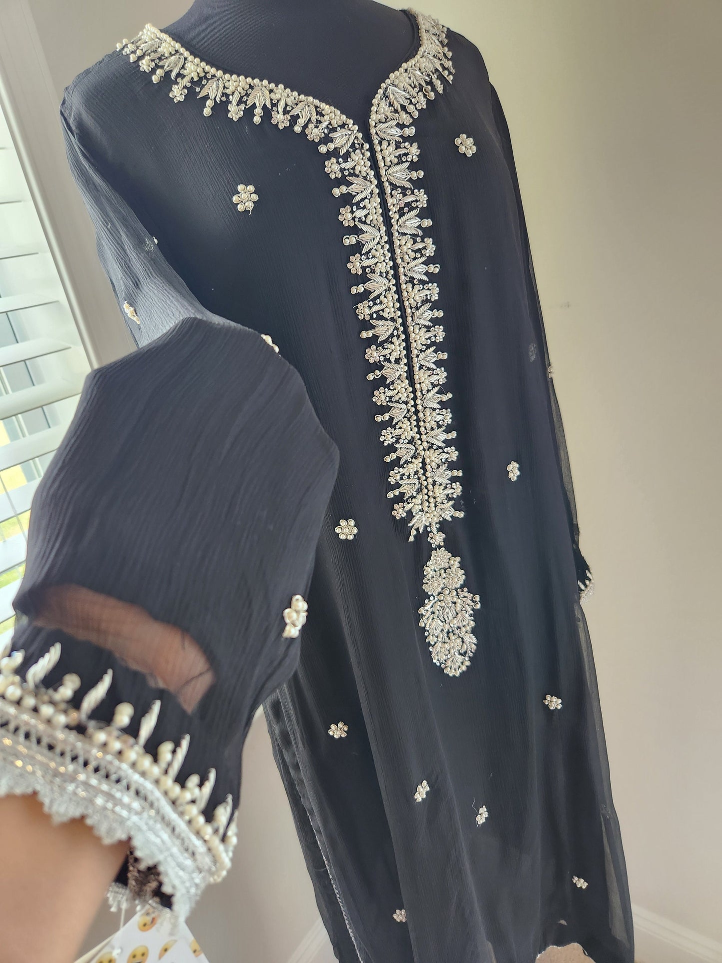 Black chiffon with silver kora dabka pearl handwork. Size large .